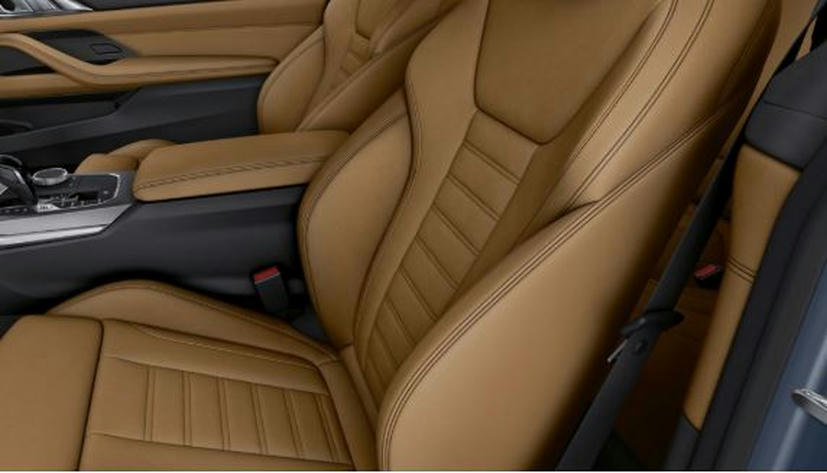 In de breedte verstelbare rugleuning.